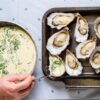 Adding dressing to Achill Oysters before cooking